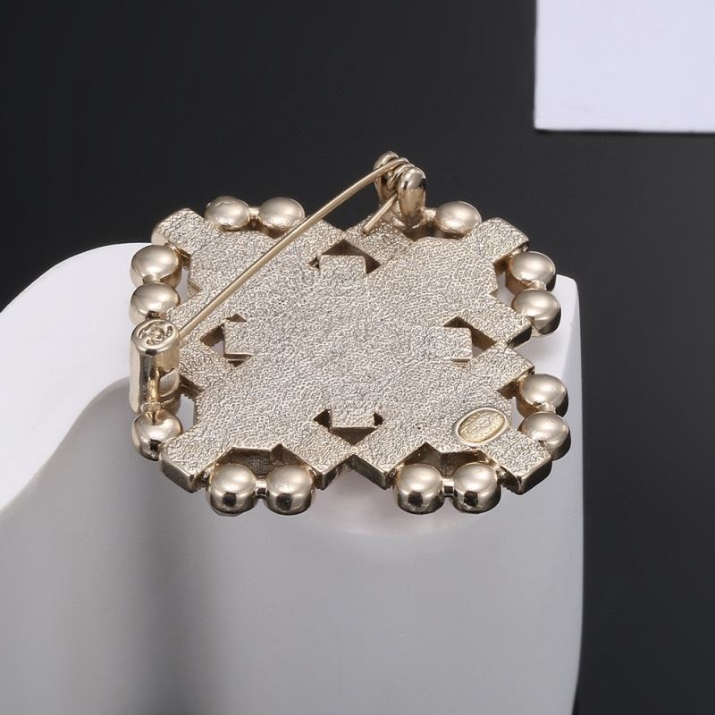 Ch**el brooches